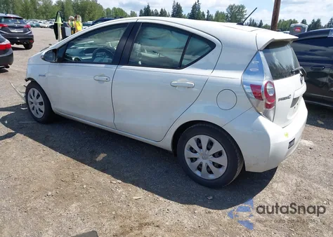 2014 Toyota Prius C Two from USA, damaged, VIN JTDKDTB34E1060001